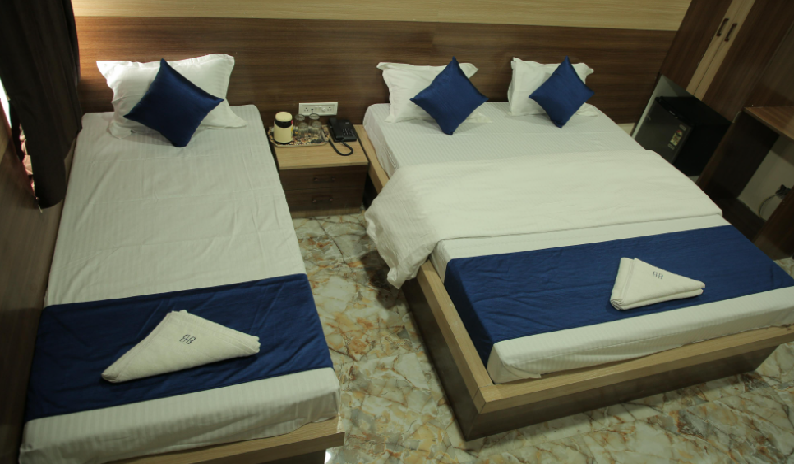 1 x Deluxe Triple Room
